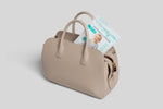 Travel-friendly clear disposable bibs in  bag