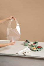 Clearly. Disposable Clear Bibs